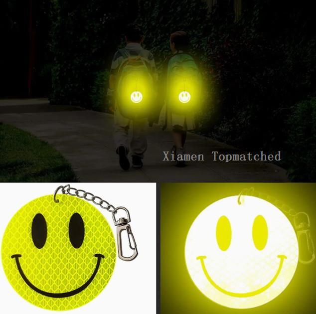 PVC reflective keychain for children schoolbag safety gifts with fluorescent yellow smile face design PVC reflective keychain for children schoolbag safety gifts with fluorescent yellow smile face design